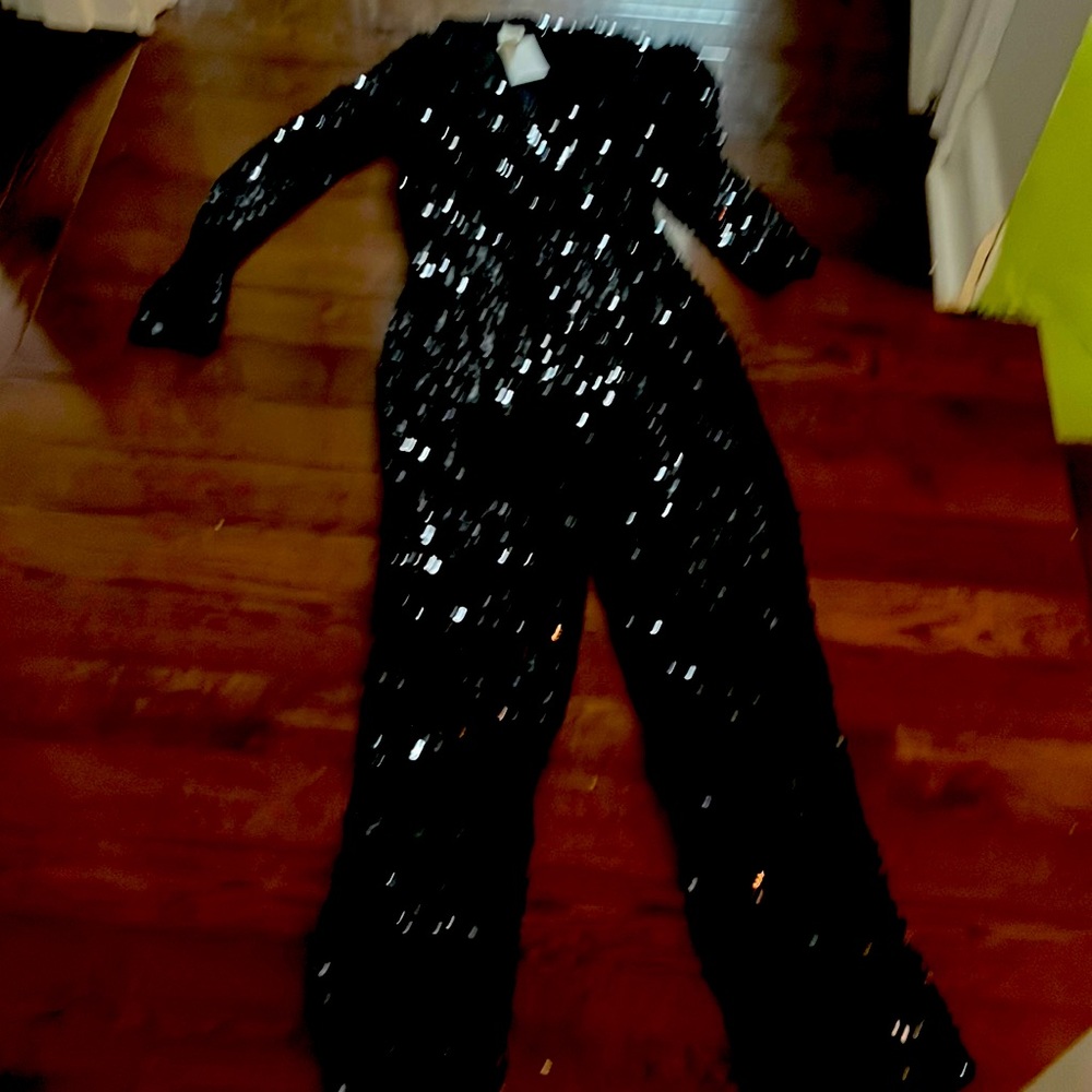 H and M sequins long sleeve romper. Never worn. XS